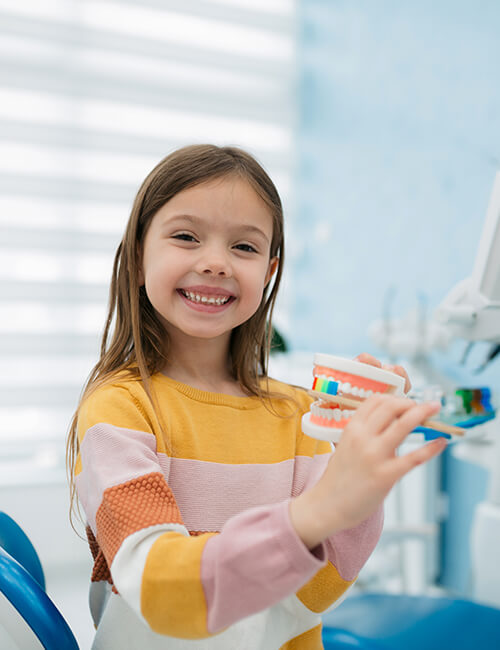 Child receiving an orthodontic check-up at North Attleboro Orthodontics